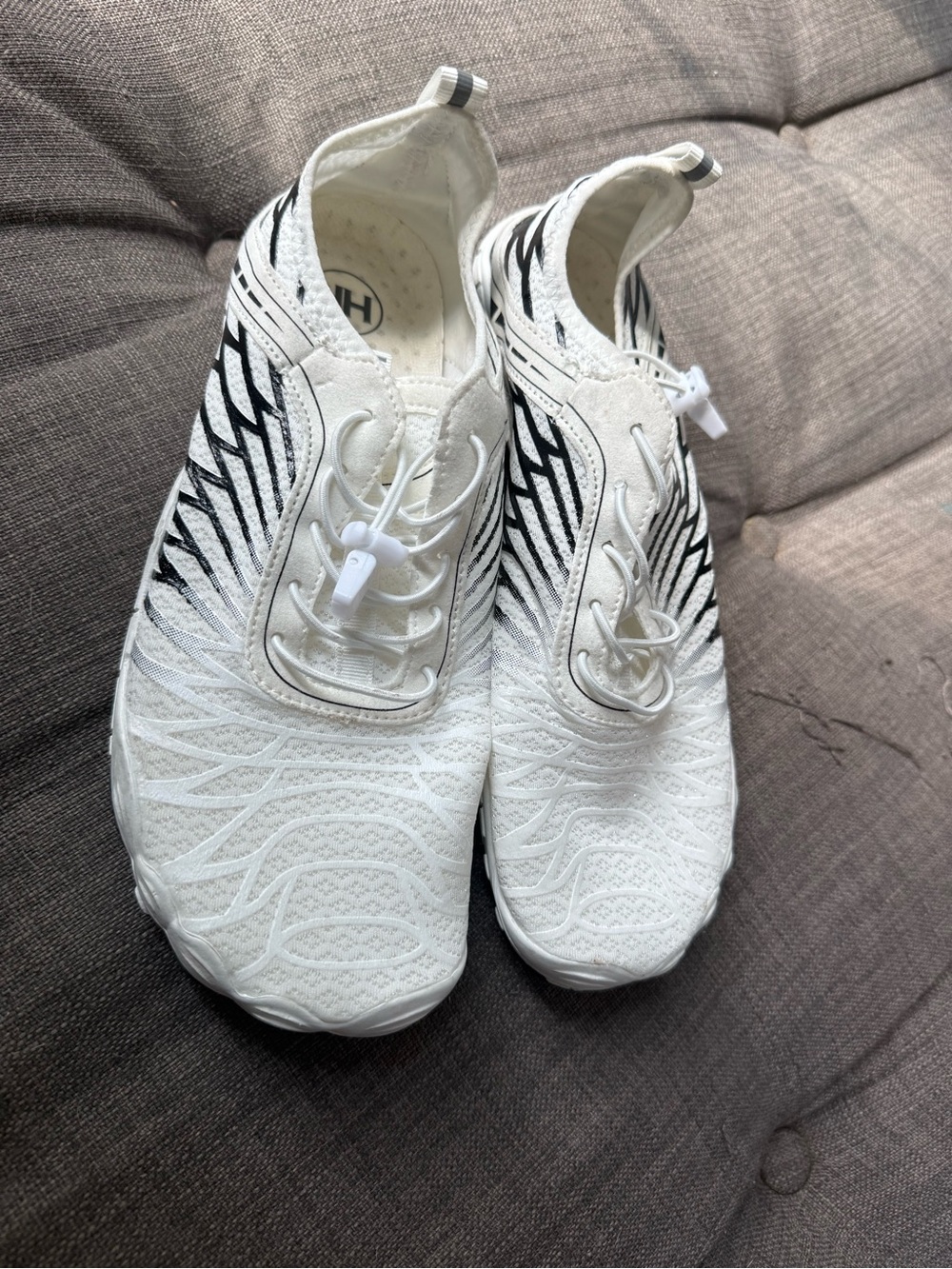 Women's White Athletic Slip-On Sneakers with Black Accent